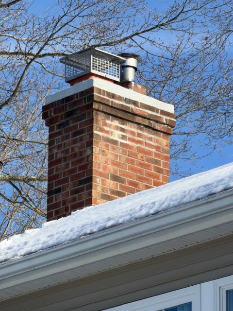 We installed a stainless steel chimney liner, correcting a condensation-damaged flue. We sealed crown cracks with protective flexible crown-coating.