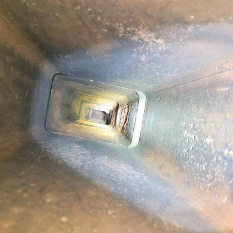 Found offset flue tiles in Darien Ct home with deteriorated mortar joints between the clay tiles which greatly affects the draft and safety of a chimney system.  Installed a gas tight chimney pipe with a rain cap.
