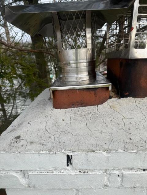 Found offset flue tiles in Darien Ct home with deteriorated mortar joints between the clay tiles which greatly affects the draft and safety of a chimney system.  Installed a gas tight chimney pipe with a rain cap.