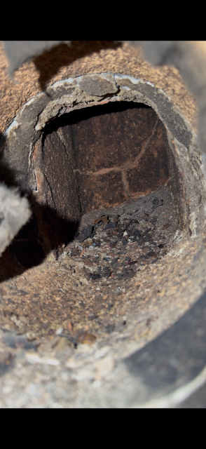 We installed a stainless steel liner to replace the deteriorated flue and safely vent combustion by-products. We protected the chimney interior from moisture damage and restored proper function.