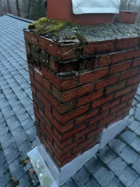 We found a north windham water deteriorated chimney. That type of brick is notorious for spalling and allowing water in, which speeds up the damage to the crown , which is pitted and receded from the brick.  We rebuilt the entire structure from the roof up.