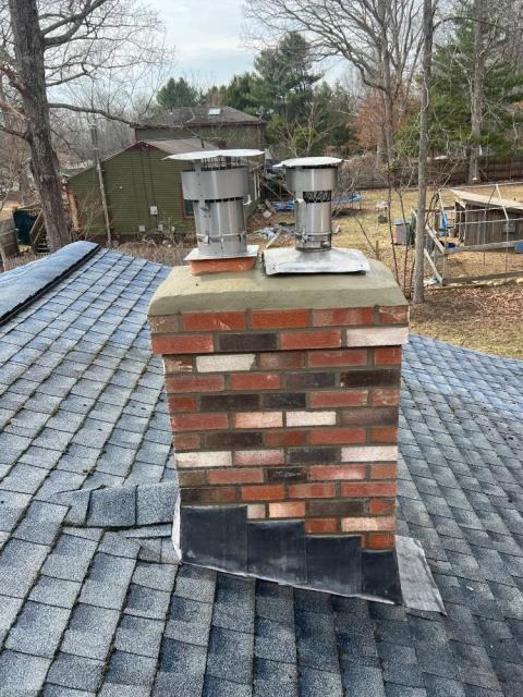 We found a north windham water deteriorated chimney. That type of brick is notorious for spalling and allowing water in, which speeds up the damage to the crown , which is pitted and receded from the brick.  We rebuilt the entire structure from the roof up.