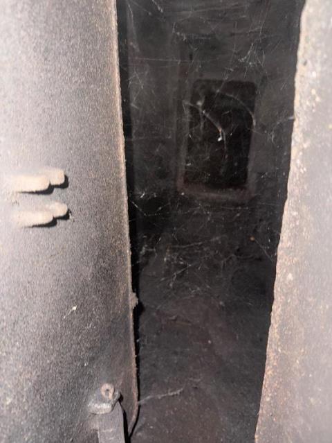 We restored smoke chamber voids and gaps above the damper with a high temperature refactory sealant (heatshield system) preventing heat and flue gas escapage in the hottest area of the fireplace at Branford ct home.
