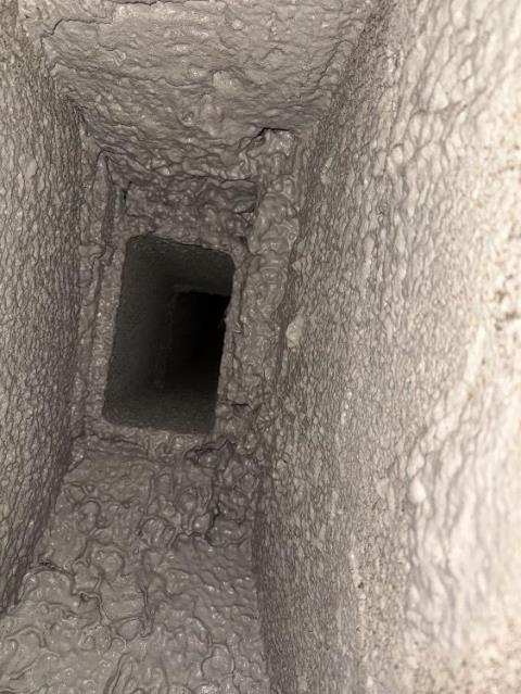 We restored smoke chamber voids and gaps above the damper with a high temperature refactory sealant (heatshield system) preventing heat and flue gas escapage in the hottest area of the fireplace at Branford ct home.