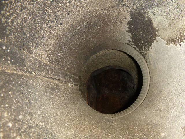 We installed a properly sized stainless steel chimney liner to correct hazardous venting and protect the masonry structure. We repaired the damaged crown, repointed mortar joints, cleaned the flue, and restored the chimney’s integrity.