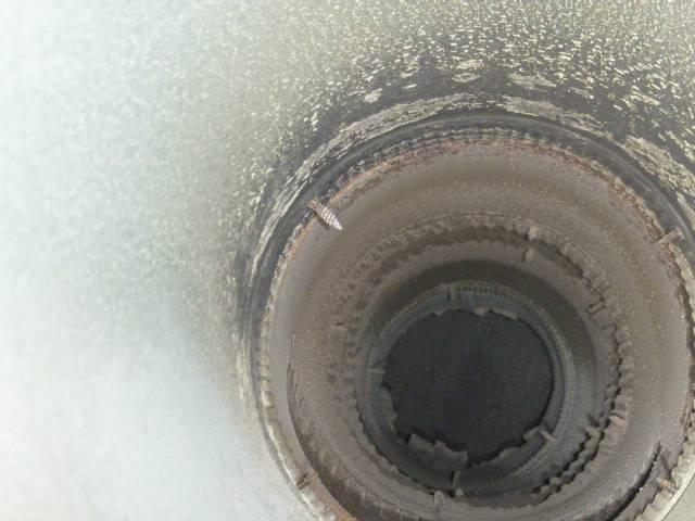 In Middletown, CT, the exhaust from two gas boilers and two water heaters is resulting in sulfuric acid damage to the flue. This is leading to poor draft, appliance issues, and structural deterioration, requiring a properly sized stainless steel liner for safe, efficient venting.