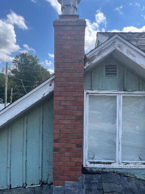 In Cheshire, CT, we installed a stainless steel liner to safely vent acidic exhaust from the furnace and prevent further chimney damage. The chimney was also rebuilt from the roofline up due to severe structural deterioration.