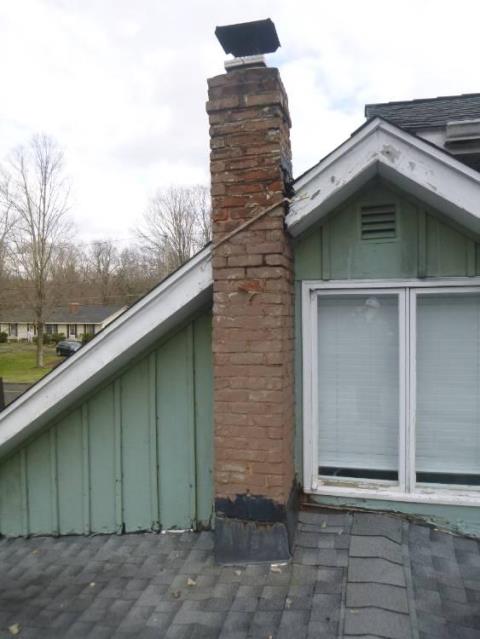 In Cheshire, CT, we installed a stainless steel liner to safely vent acidic exhaust from the furnace and prevent further chimney damage. The chimney was also rebuilt from the roofline up due to severe structural deterioration.