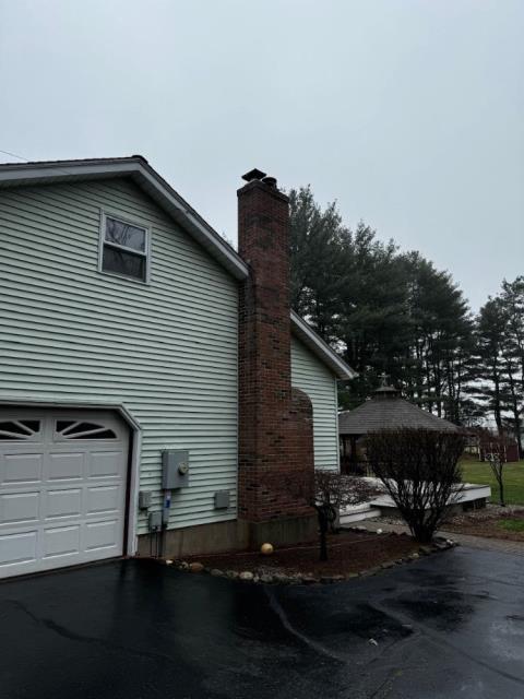 Swept liner for main level free standing wood stove clean and clear of most soot and loose debris.