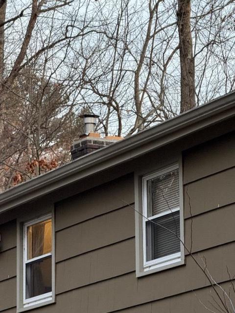 In Tolland CT We installed a properly sized UL-listed 316L smoothwall stainless steel chimney liner system. We secured all components and completed the warranted workmanship.