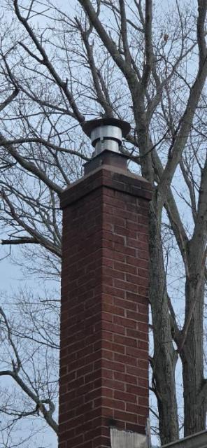 Installed a properly sized gas tight stainless steel liner system to vent the oil flue , with a top plate and cap in south Windsor ct