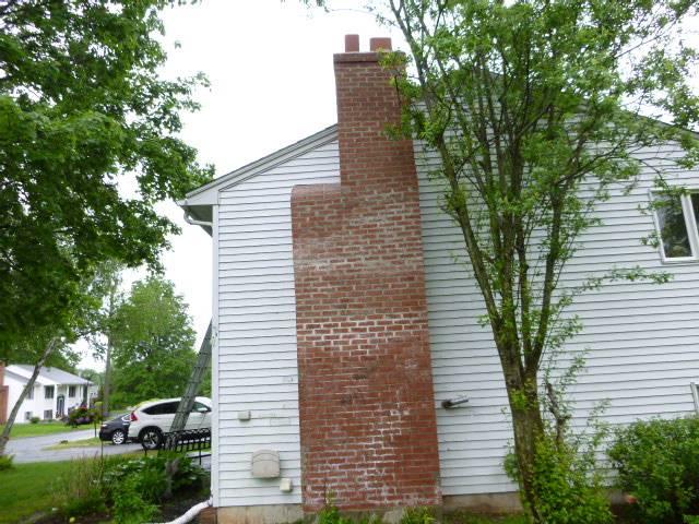 We rebuilt the entire chimney structure, smoke chamber, and flue system to meet current code requirements. We removed obstructions, installed new flashing and bluestone components, and hauled away all debris.