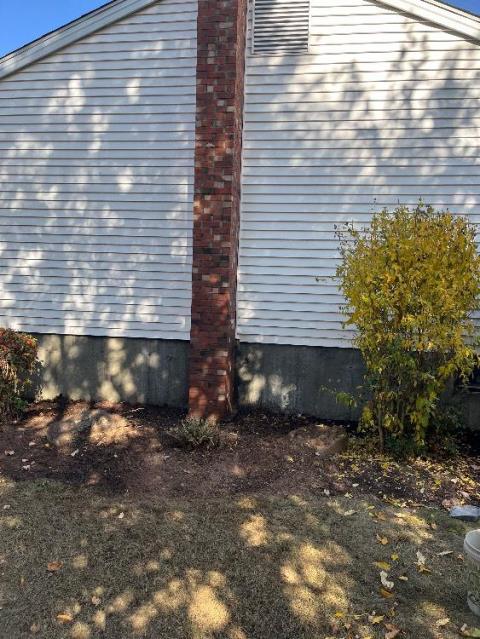 We installed a stainless steel liner for safe boiler venting. We rebuilt the chimney and chimney footing due to structural deterioration.