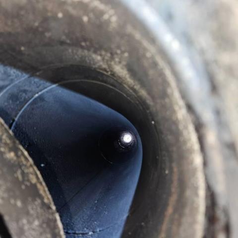 We inspected the prefabricated fireplace system and found it functional with no cleaning currently required. We identified disconnected dryer vent piping and missing ridge vent components requiring repair.