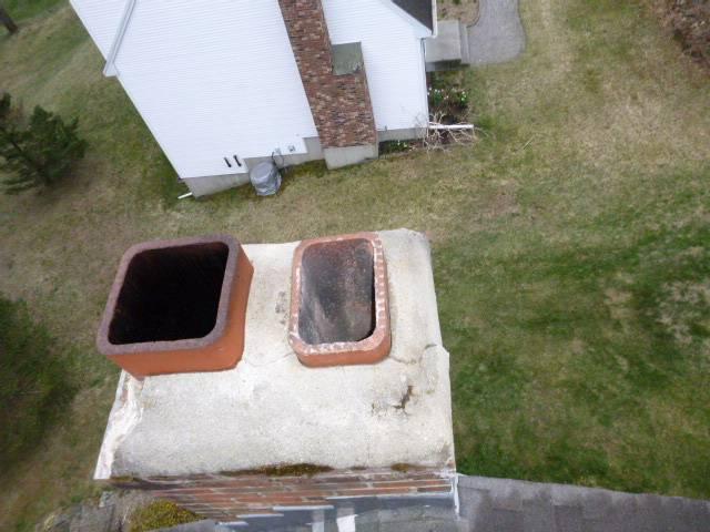 In Torrington, CT, We installed a stainless steel two-ply smooth wall liner to ensure proper venting of the high-efficiency oil boiler. We also repaired and sealed the chimney crown to protect the exterior structure from further damage and reinstalled the customers caps per request.