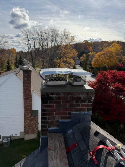 In Torrington, CT, We installed a stainless steel two-ply smooth wall liner to ensure proper venting of the high-efficiency oil boiler. We also repaired and sealed the chimney crown to protect the exterior structure from further damage and reinstalled the customers caps per request.