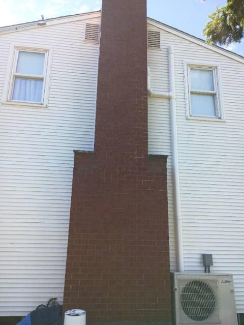 Condensation from an uninsulated liner and water intrusion were deteriorating the chimney’s masonry, crown, and shoulders. We’re insulating the liner, repairing masonry defects, rebuilding shoulders, and waterproofing the structure.