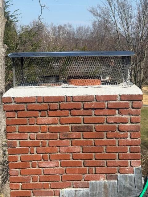 We removed cap, repaired crown with waterproof mortar, and reinstalled cap. We addressed acid damage and recommended annual liner maintenance.