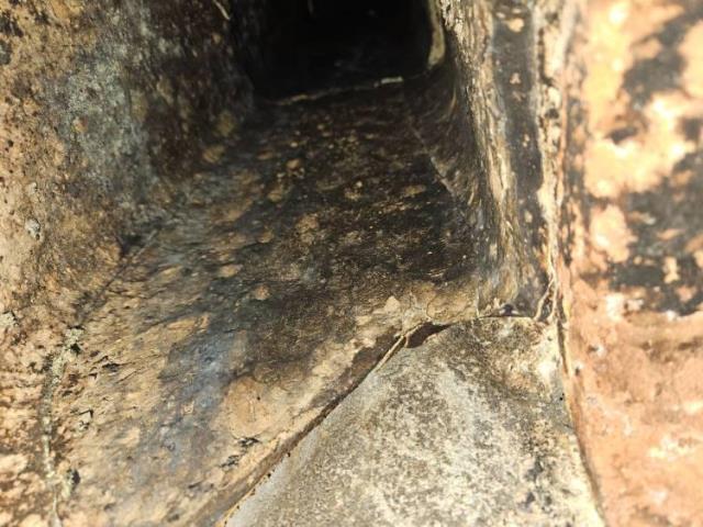Installation of a new chimney liner system due to rotted original flue tile in Groton Ct home , we also replaced the rusted connector pipe to safely vent the  furnace.