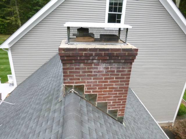 Chimney Crown in Wallingford Ct had some minor damage , cracks and receding from brick.  Did some preventative maintenance crownseal repair to keep the chimney watertight