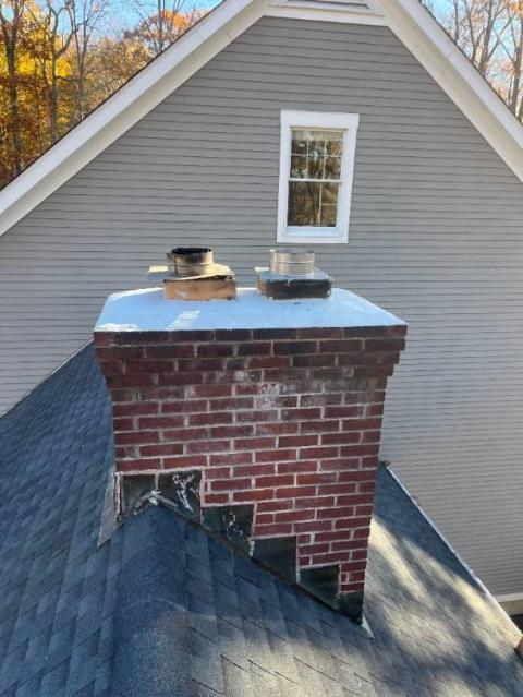 Chimney Crown in Wallingford Ct had some minor damage , cracks and receding from brick.  Did some preventative maintenance crownseal repair to keep the chimney watertight