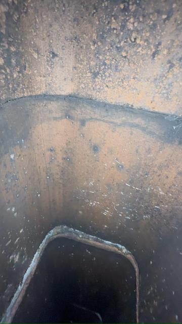 In Newtown, CT, We installed a UL Listed stainless steel 316L Smoothwall liner system to replace the deteriorated flue. A new stainless steel rain cap was also installed for protection and safety.