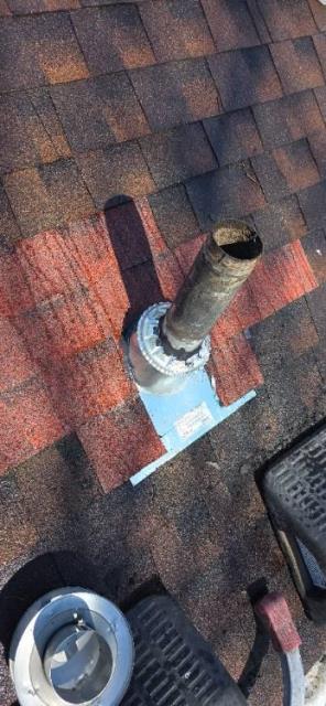 We came out to investigate an active leak in Middletown, ct, caused by a failed flashing kit around pellet stove vent.  The pipe work itself is stained but functional.  Homeowner opted to keep it as is and concentrate on solving the leak.   We removed surrounding shingles, replaced the full chimney flashing system with new ice and water barrier, and restored a watertight seal to prevent further water intrusion and structural damage.