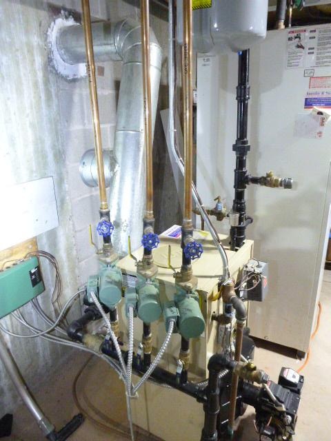In Wallingford, CT We installed a stainless steel two-ply smooth wall liner to restore proper venting and bring the oil boiler back to code. We reconstructed the cement crown and repointed the damaged masonry to stop water and acidic moisture from causing further deterioration.