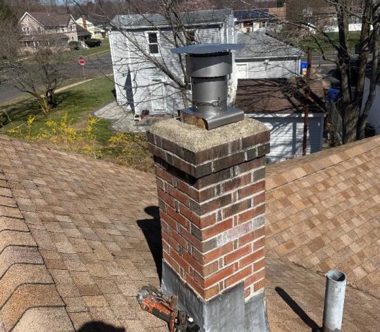 We installed a properly sized stainless steel liner to bypass the damaged flue. We restored safe venting and reduced condensation-related deterioration.