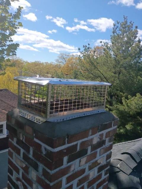 We replaced damaged flashing with properly installed coil stock to prevent water intrusion. We rebuilt the crown to improve drainage and protect the chimney structure. Reinstalled customers chimney cap.