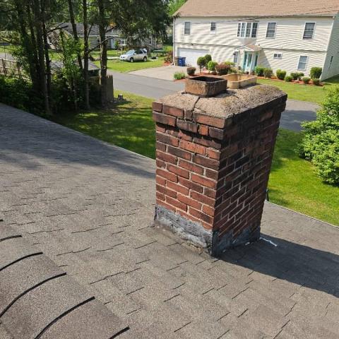 In Vernon , ct , We installed a stainless liner, replaced the connector pipe, and added a chimney rain cap. We rebuilt the crown and brickwork, then completed inspection and sweeping.