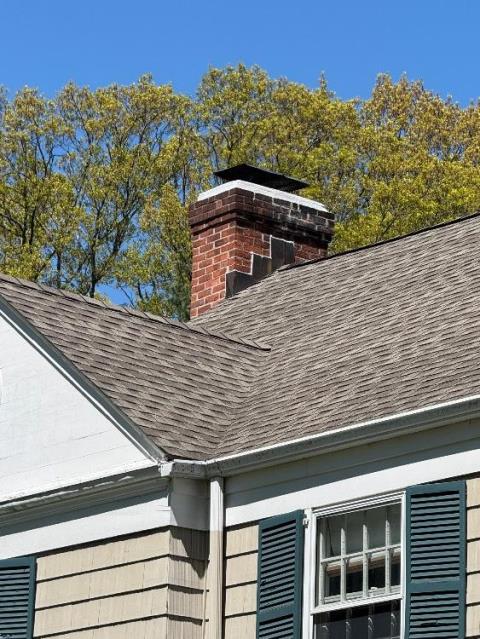 We repaired deteriorated flue voids and restored safe venting throughout the fireplace system. We removed glazed creosote and repaired exterior masonry deterioration via a repointing and a crown seal.