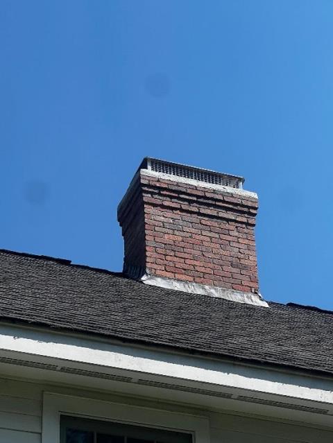 We installed a stainless steel chimney cap, repaired crown fractures, and repointed some damaged brickwork. We swept the fireplace and installed two dryer vent bird guards.