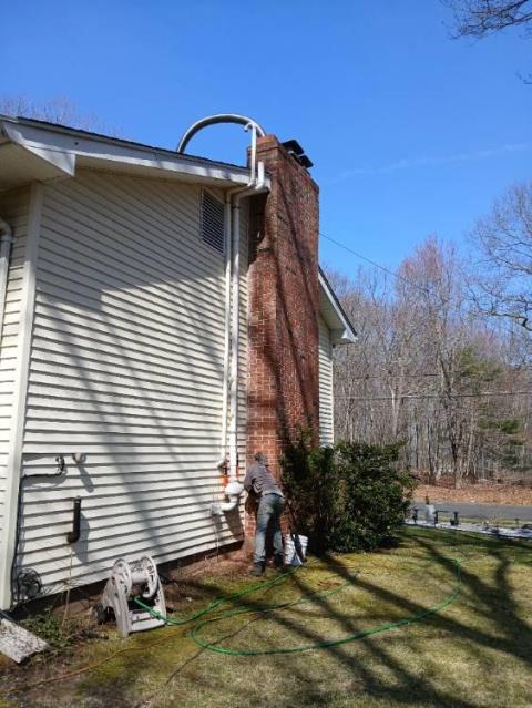 We installed a properly sized stainless steel liner to correct venting and condensation issues. We repaired the crown with waterproof mortar to prevent water intrusion.