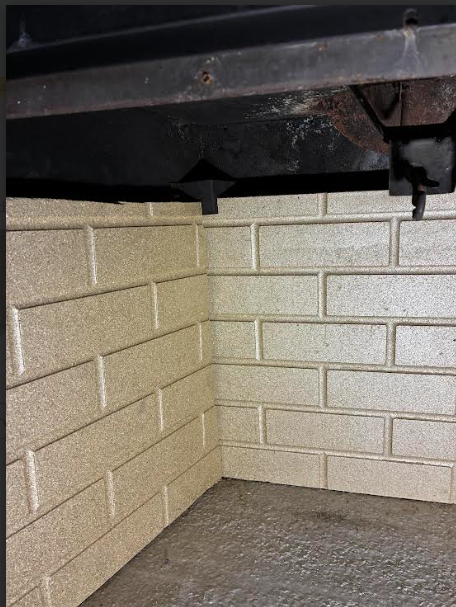 In Meriden CT, Removed severely deteriorated prefabricated fireplace panels and replaced with new refractory panels.