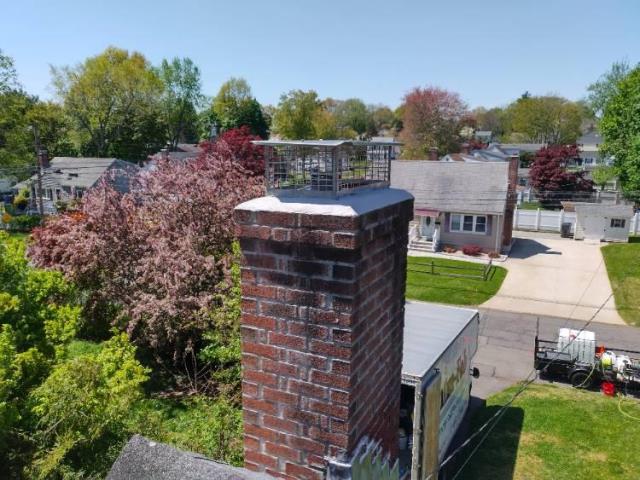 Performed some minor preventative maintenance repair.  We repointed some mortar joints and crown sealed the crown in West Hartford Ct to prevent water intrusion and protect the masonry structure.