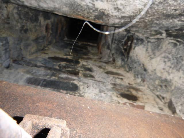 In Windsor CT, Homeowner Has a High Efficient Beckett AFG Oil Burner Tied Into the Original Oversized Tall Cold Exterior Chimney Structure, the exhaust of which is mixing with condensation and causing sulphuric acid damage to the flue. Recommend a stainless steel 2-ply chimney liner to provide safety and longevity of the venting system.