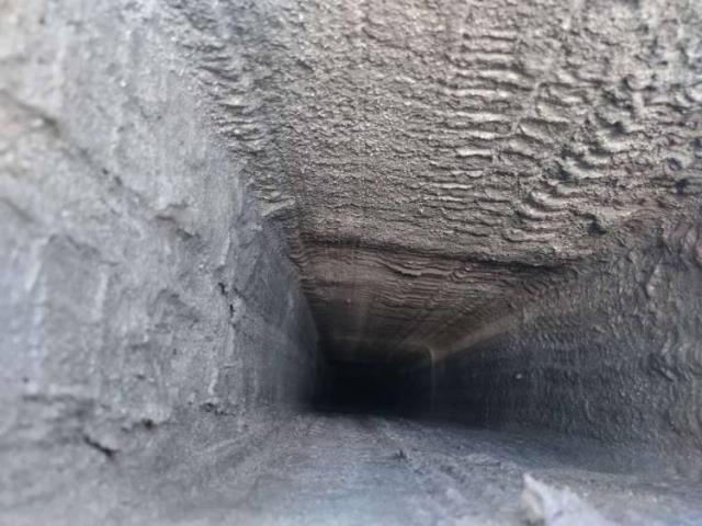 Upon arrival in West Hartford, CT, we Found The Top Of The Chimney uncapped. The Fireplace Venting System Has Cracked Flue Tiles, And Missing Mortar Joints Between The Flue Tiles.  Recommend heat shield application.