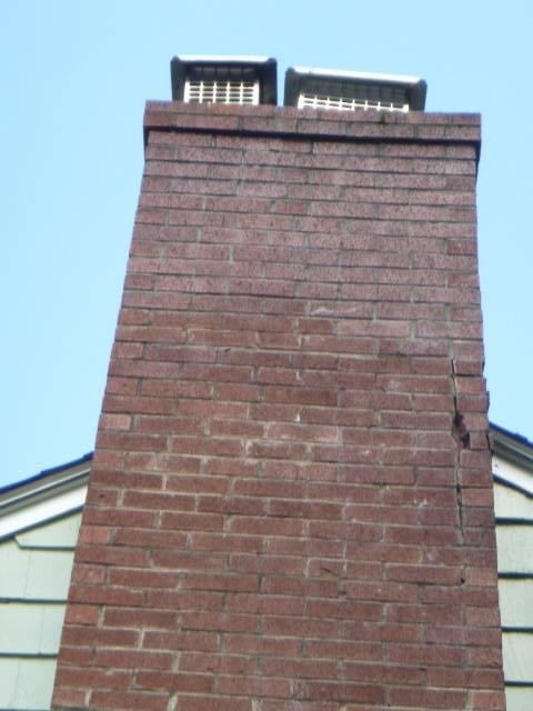 This chimney in Manchester CT had missing mortar and separated bricks on one side of it. We toothed in new bricks and mortar , and repointed other areas , without having to rebuild the whole thing , which was a larger project than the homeowner was prepared for.  In this case , the repair was a viable alternative.