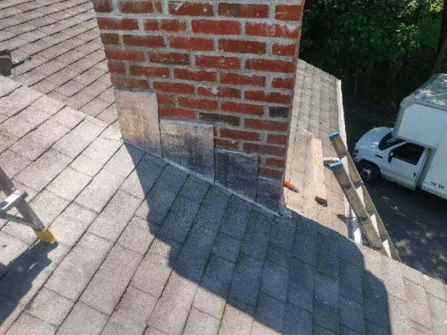 We found a fractured crown and failing flashing allowing water intrusion. We're applying HeatShield, replacing and embedding new lead flashing, repairing the crown, and securing the cap for lasting protection.