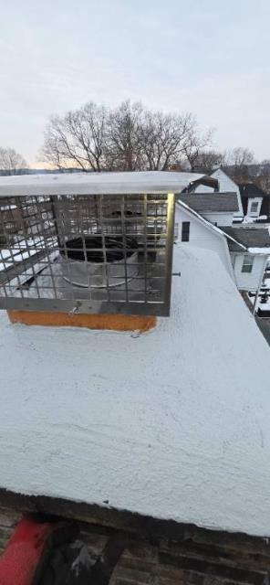 In Bristol CT We installed a stainless steel liner for the oil boiler and replaced rusted non stainless steel cap.  This corrected acidic condensation and protected the chimney and home.