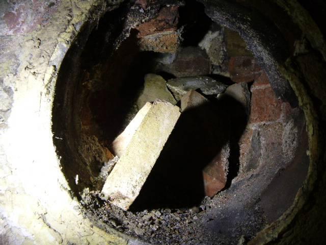 We found a collapsed, undersized flue restricting safe venting in West Hartford home.  We removed blockage and installed a properly sized stainless steel smooth-wall liner with a chimney cap.