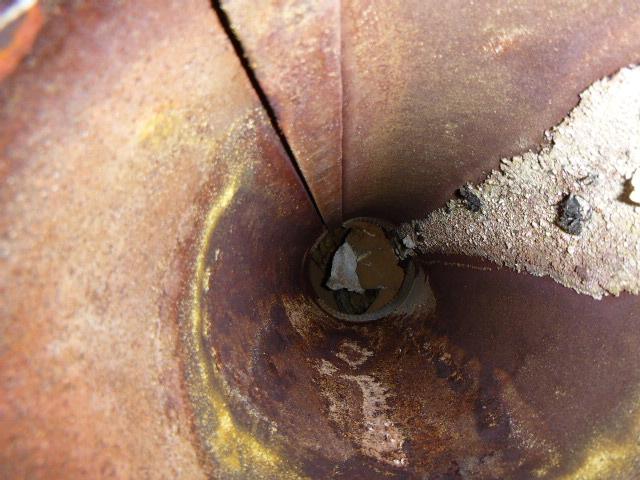 We’re removing collapsed, acid-damaged flue tiles, installing a properly sized stainless steel liner in Glastonbury, ct  and rebuilding the deteriorated chimney crown to restore safe, efficient venting and protect the masonry.