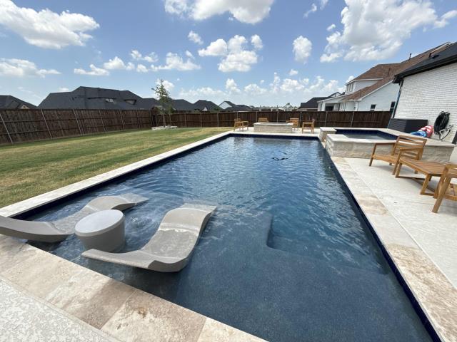We love this recent BMR build in Haslet where we do weekly pool service! This pool features travertine coping, a micro pebble interior finish all Jandy equipment and a salt system! It makes pool maintenance a breeze!