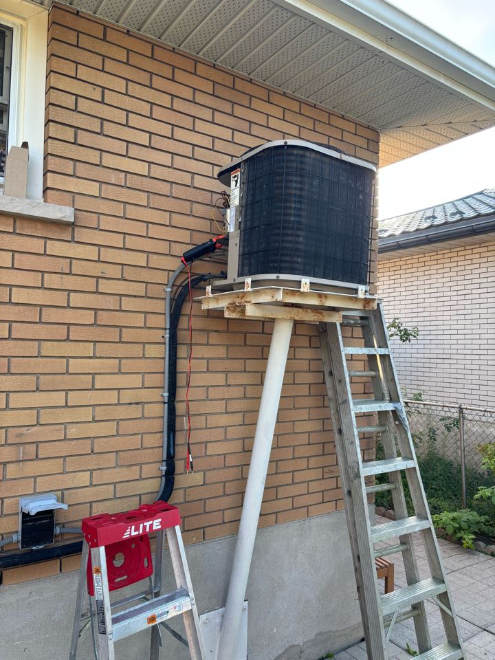 Completing an Ac service for a family in Elmira Completing an Ac service for a family in Elmira