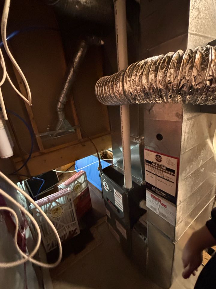Completing an Amana furnace tune up for a family in the Rummelhardt area of Waterloo