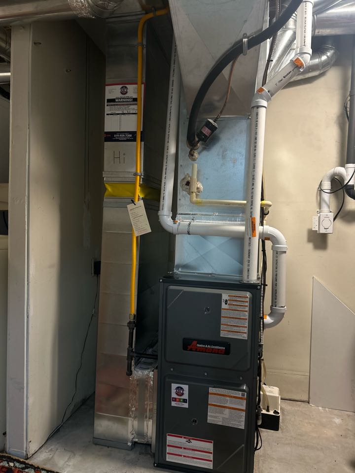 Completing an Amana furnace install for a family in the Parkwood Gardens area of Guelph