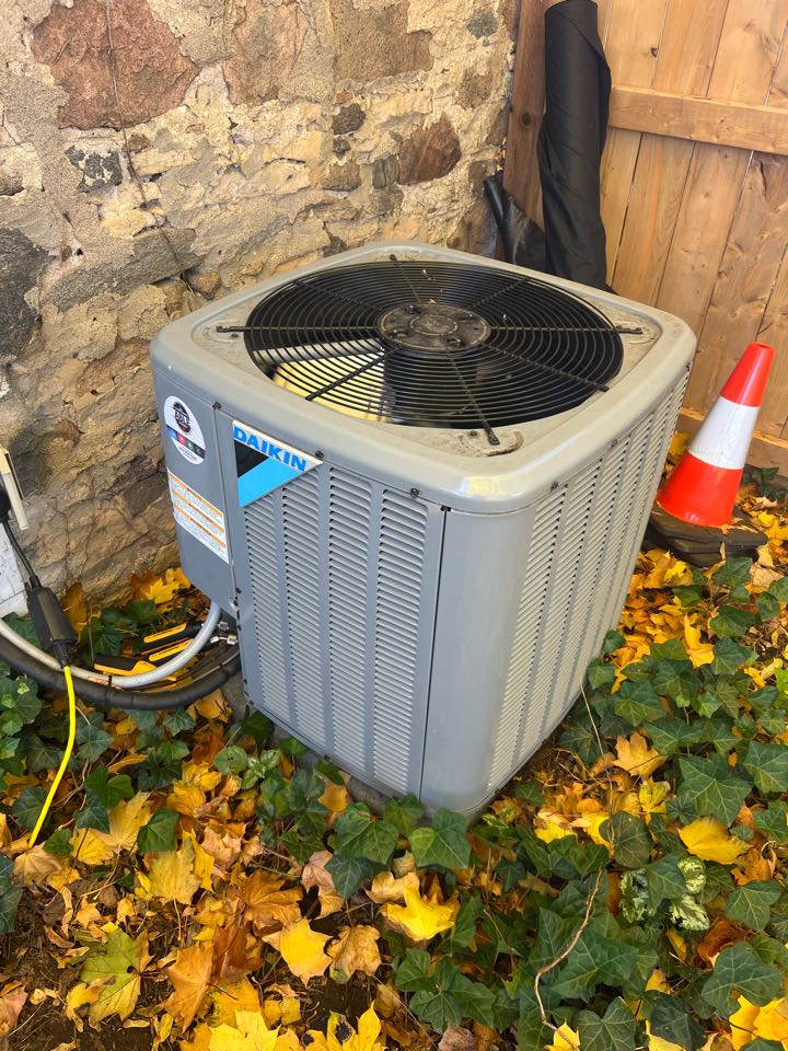Servicing a Daikin AC for a family in Cambridge