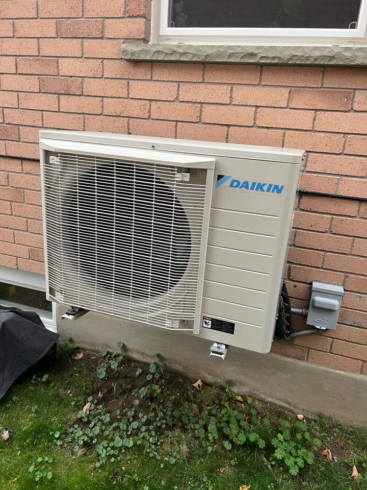 Servicing heat pump for a family in Kitchener 