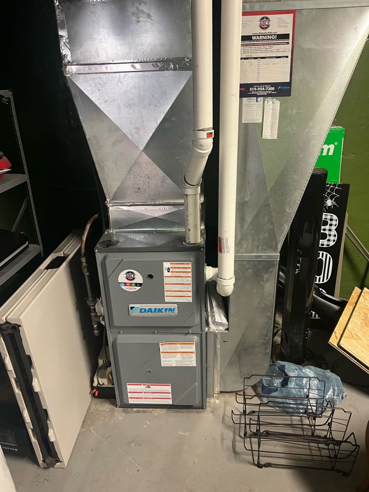 Servicing furnace for a family in Kitchener 